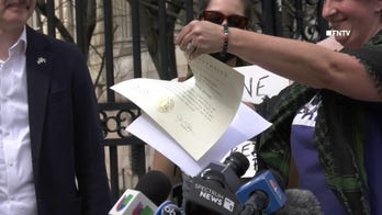 Columbia University grads shred diplomas in protest over school's cooperation with Trump administration
