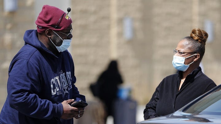 US braces for COVID-19 surge as pandemic measures show signs of working