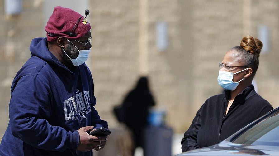 US braces for COVID-19 surge as pandemic measures show signs of working