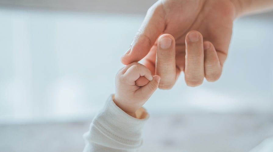 Nurses rush to assist with baby delivery outside of hospital
