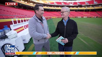 Steve Doocy hits the field with Rob Riggle at Arrowhead Stadium
