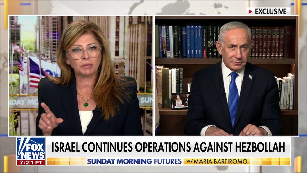 Netanyahu warns Iran of 'forceful' response if attacked