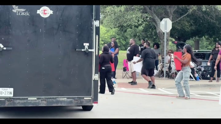 Tense confrontation breaks out between drivers and Karmelo Anthony supporters outside courthouse