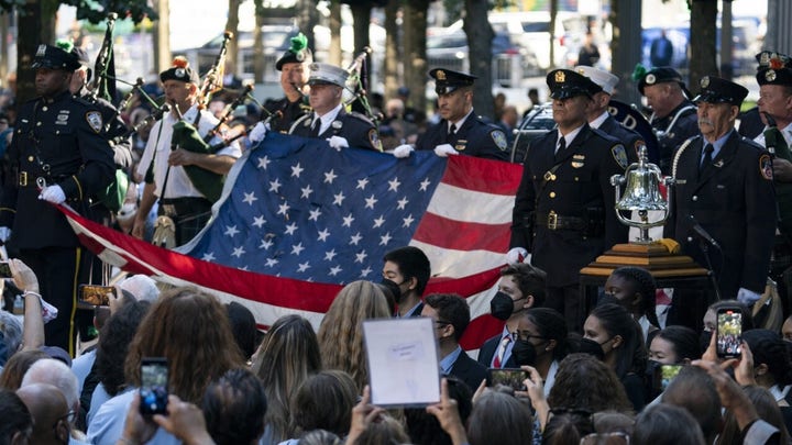 Memorial visitors pay tribute to lives lost at Ground Zero 20 years ago