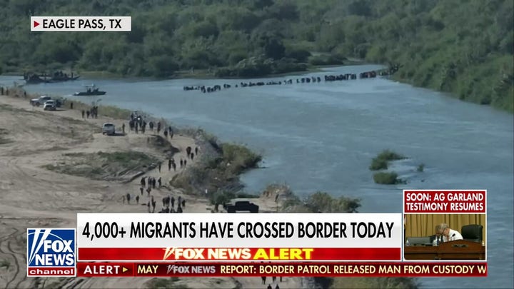 More than 4,000 migrants cross US border in one morning