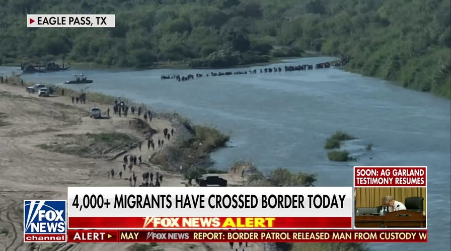 Over 4,000 migrants cross US border in one morning