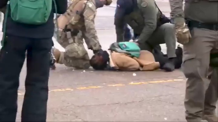 Protesters confront federal agents day after deadly Minneapolis shooting