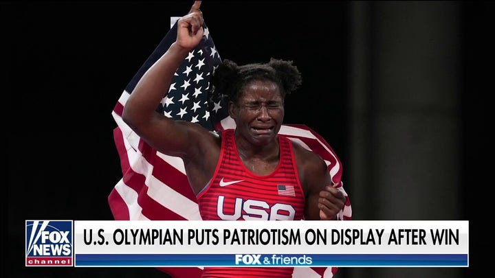 US Olympian puts patriotism on display after winning gold in Tokyo
