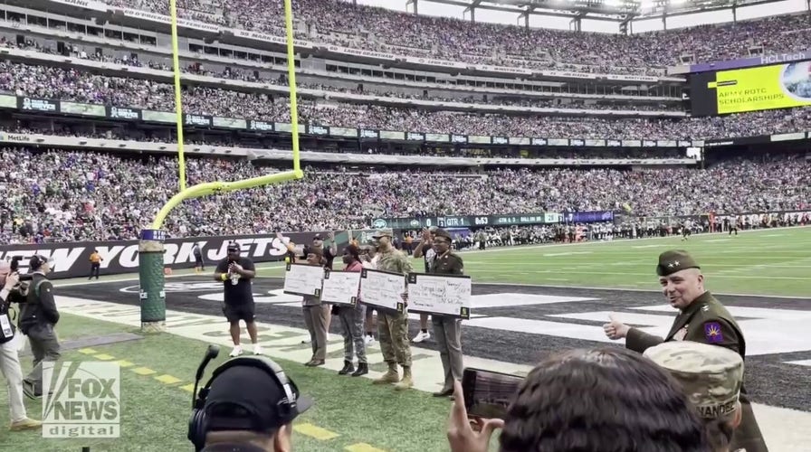 Four students are surprised with U.S. Army Minuteman scholarships at New York Jets game