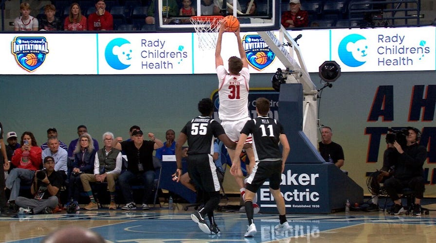 Wisconsin’s Nolan Winter throws down   slam dunk, taking pb  implicit    Providence