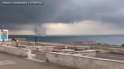 Terrifying tornado caught on camera ripping through Sicily as violent winds wreak havoc