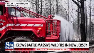NJ wildfire scorches 13,500 acres as firefighters work toward containment