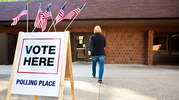 Democrats promote in-person voting