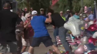 Man appears to vandalize Charlie Kirk memorial outside Turning Point USA headquarters in Phoenix