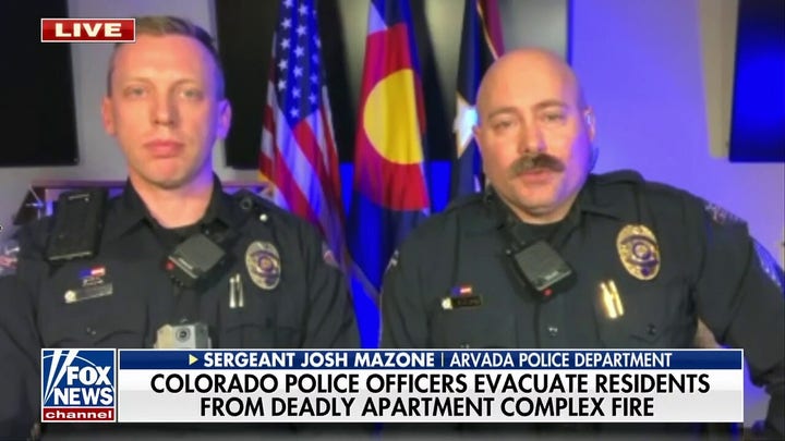 Colorado police officers save residents in burning apartment complex