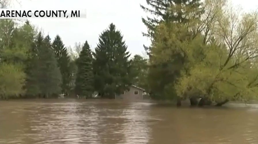 Thousands evacuated after two dams collapse in Michigan