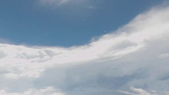 Air Force hurricane hunters inside Ian's eye capture eerie calm, blue skies