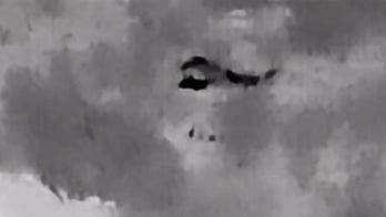 Mexican drug cartel operatives seen throwing explosives near Rio Grande