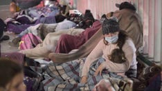 US begins admitting migrants from Mexico, as Biden administration winds down Trump-era policy