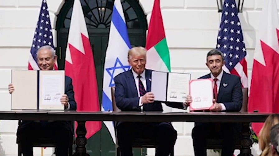 Trump declares ‘dawn of a new Middle East’ as he presides over signing of historic deals