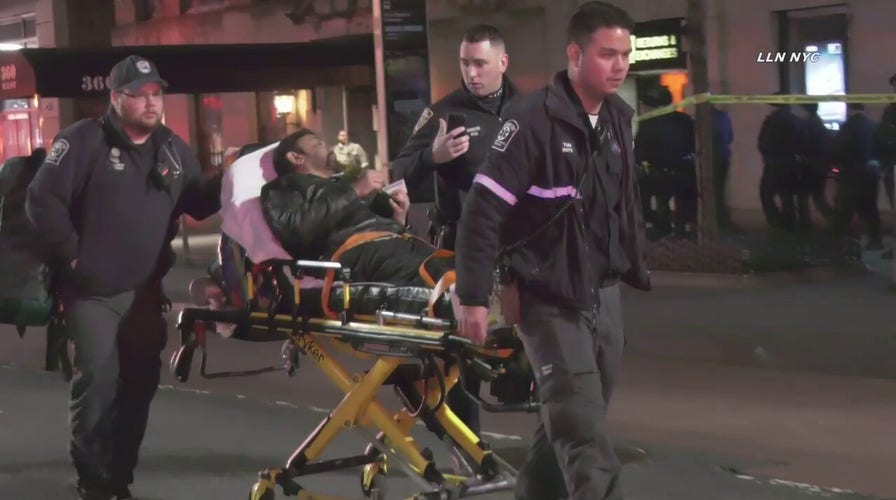 Driver plows through civilians and cops in New York City