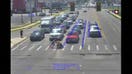 Driver in Spider-Man costume helps man in wheelchair cross busy intersection in Arkansas