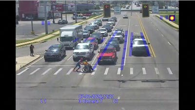 Driver in Spider-Man costume helps man in wheelchair cross busy intersection in Arkansas - Fox News