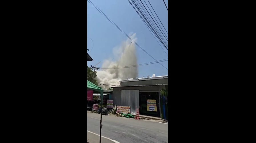 Chaos in Bangkok as apartment building collapses, sending people running