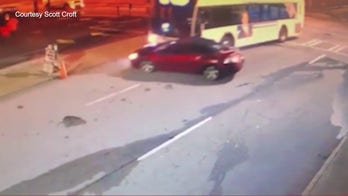 Atlanta bus pushes car down street in wild scene caught on video