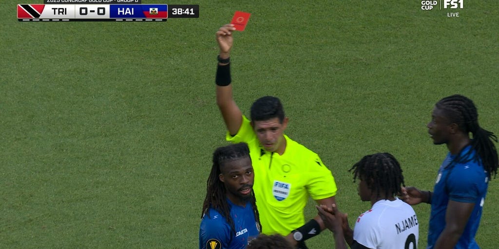 Haiti's Jean-Kevin Duverne picks up a red card vs. Trinidad & Tobago