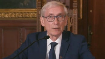 Wisconsin's governor puts a stop to Tuesday's primary vote	