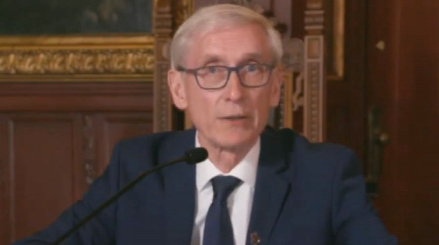 Wisconsin's governor puts a stop to Tuesday's primary vote	