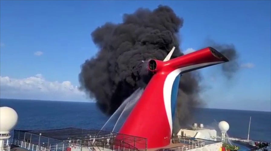 Footage shows a Carnival Cruise ship on fire in Turks and Caicos