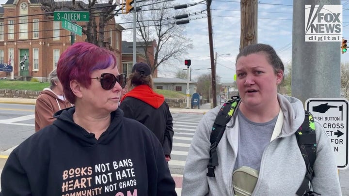 Protesters tell their side of the story at RFK Jr. event in Martinsburg, WV.