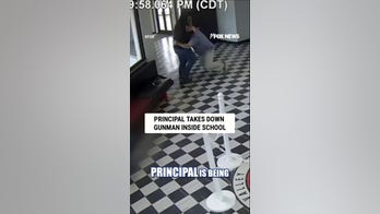 WATCH: Principal takes down school gunman