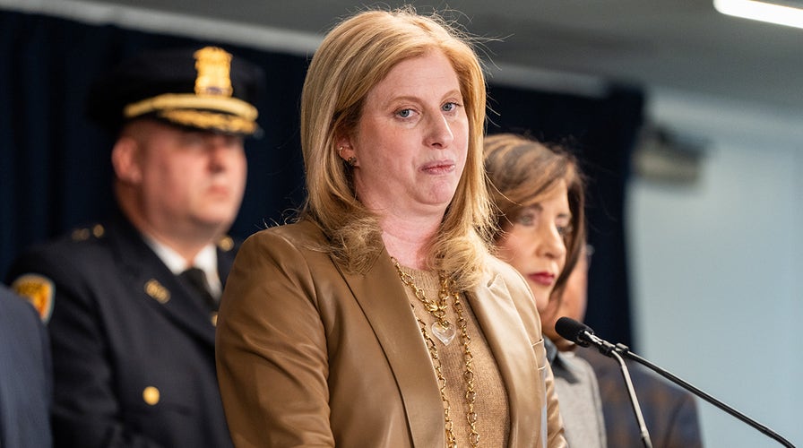  NYPD commissioner, US Attorney clasp  a property   conference