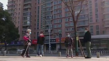 Beijing streets empty as coronavirus outbreak spreads