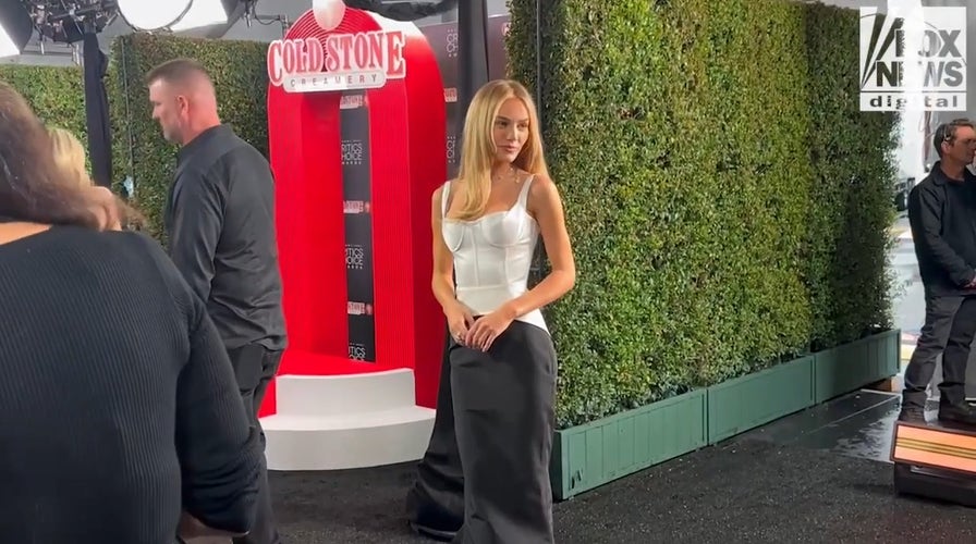 'Landman' star Michelle Randolph poses on the Critics Choice Awards red carpet