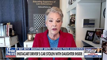 Police bodycam captures frantic rescue of toddler from stolen car