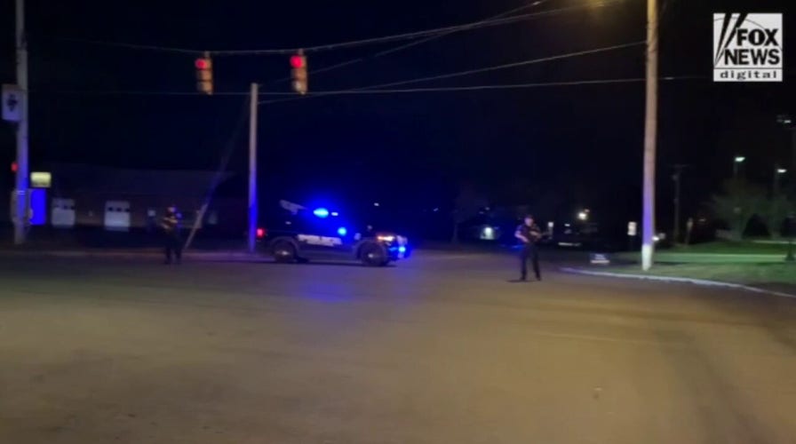 Authorities near the recycling plant where Robert Card was found dead