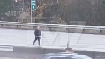 Video shows suspect drag trooper, steal Washington State Patrol vehicle on I-5