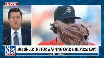 MLB under fire for warning over Bible verse caps
