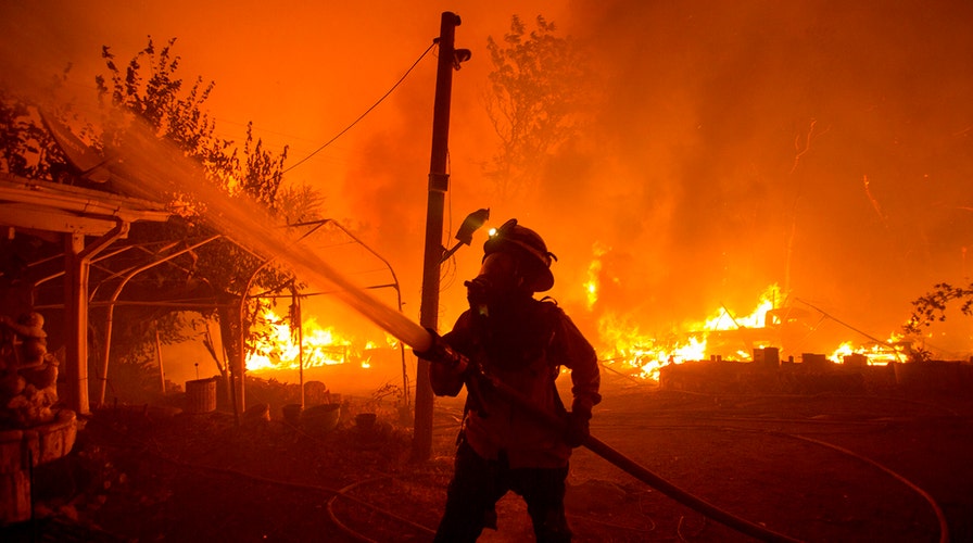 California firefighters battle fast-moving wildfire near Los Angeles