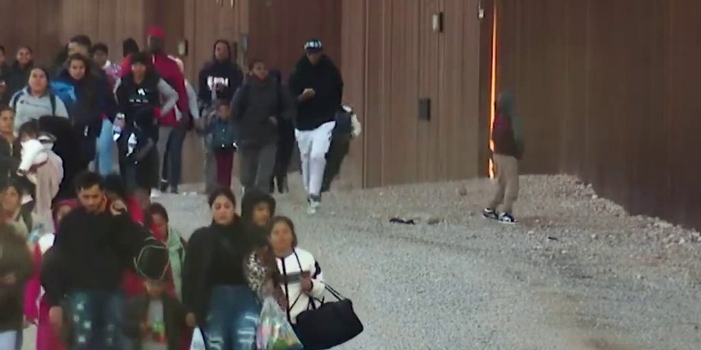 WATCH Dozens Of Migrants Breach Border Wall Take Selfies On US Side   Image 