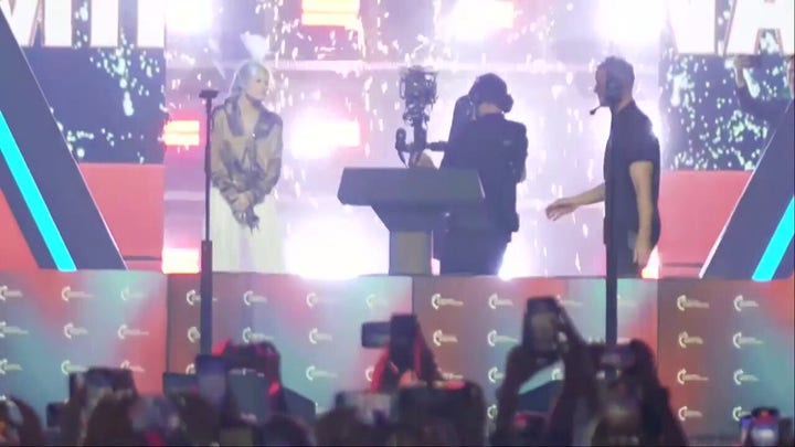 Erika Kirk welcomes Nicki Minaj as surprise guest for AmericaFest