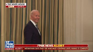Biden smiles after a reporter asks about the Trump case - Fox News
