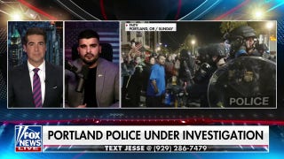 Journalist arrested by Portland police during ICE protests