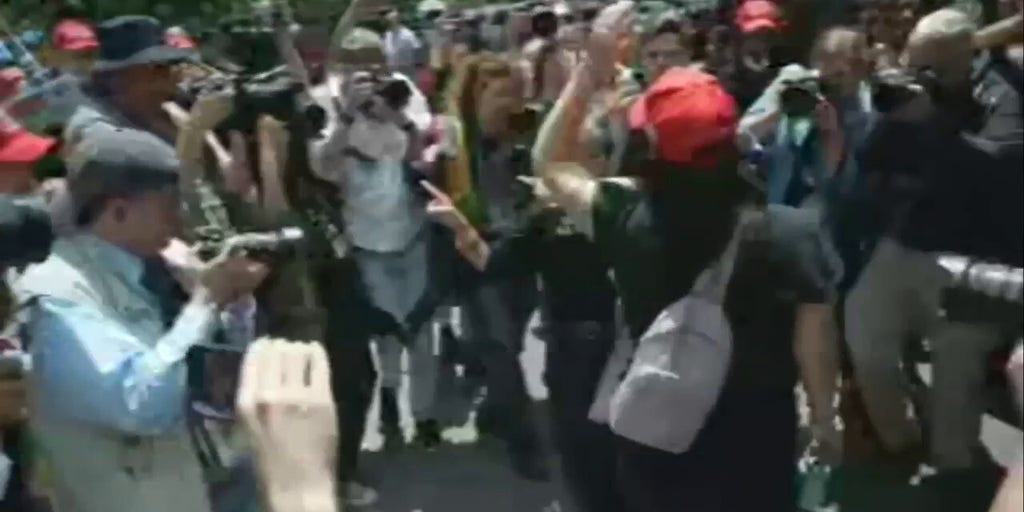 Former President Trump trial protesters gather outside of the courthouse