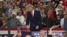 Trump arrives with hats for supporters at Ohio midterm rally
