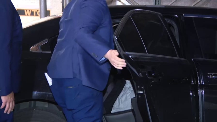 NYPD detectives escort Rhamell Burke, accused of fatally shoving elderly man down subway stairs
